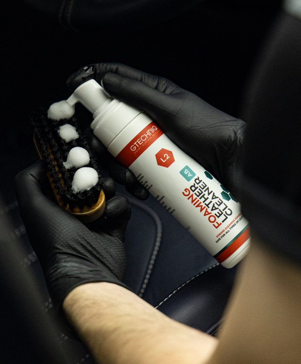 Gtechniq L2 Foaming Leather Cleaner foam being dispensed onto a leather brush
