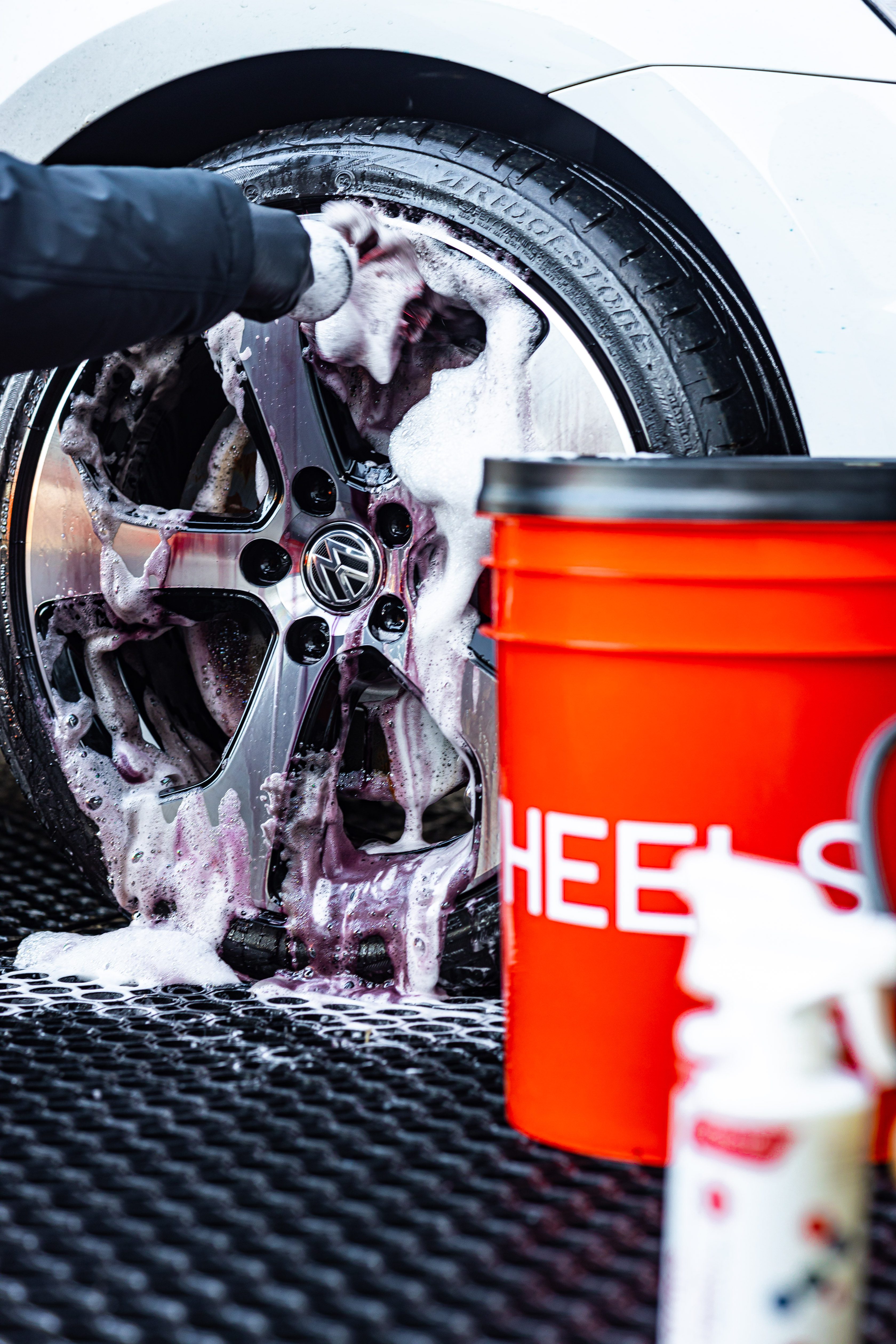 Gtechniq W6/ Iron Remover being sprayed onto an alloy wheel
